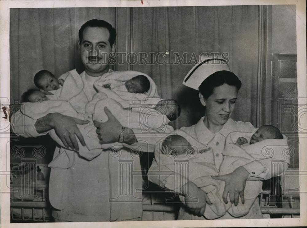 1936 Press Photo Nurse Wilma Elder and Dr. R.H.Rieselman with the set of twins - Historic Images