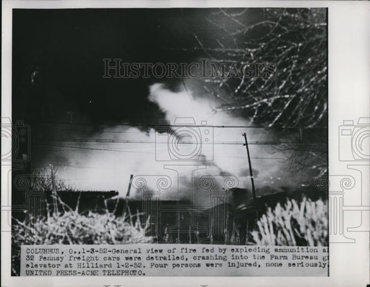 1952 Press Photo Fire fed by exploding ammunition at 32 Pennsy derailed cars - Historic Images