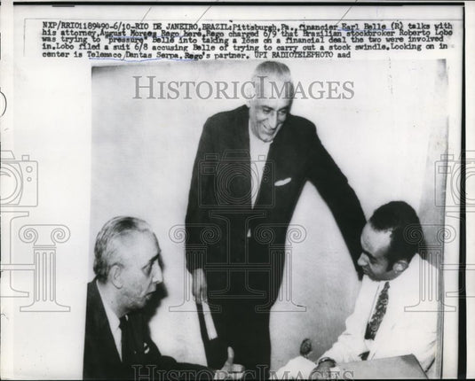 1959 Press Photo Financier E. Belle & attorney A.M. Rego discussing accusations - Historic Images