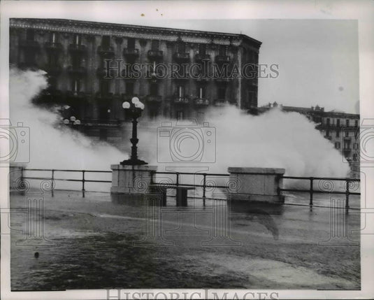 1954 Press Photo Bari Italy Wind driven waves crash over seawall on Bari's - Historic Images