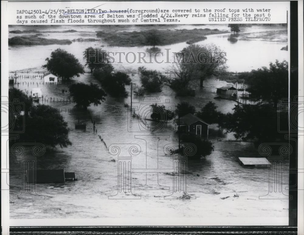 1957 Press Photo Two houses covered to the rooftops with water - Historic Images