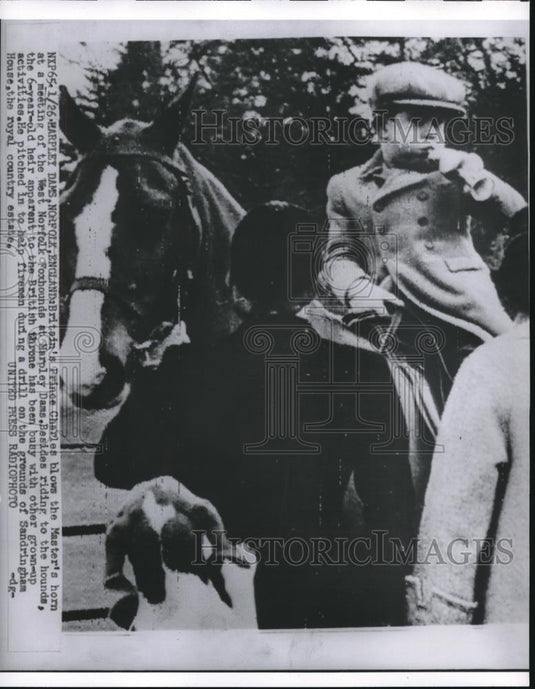 1955 Press Photo Prince Charles blows Master's Horn at West Norfolk Foxhounds - Historic Images