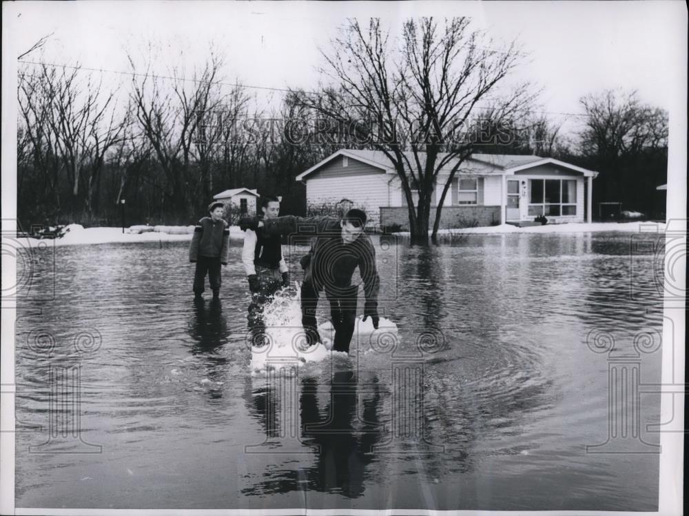 1962 Press Photo Boys with Hip Boots Play in Flooded Des Plaines River - Historic Images