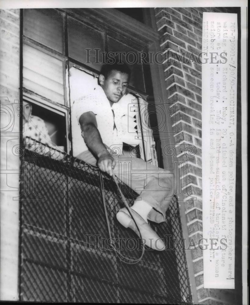 1950 Press Photo Richard J. Nuby, 20, climb out of Cincinnati Furniture - Historic Images