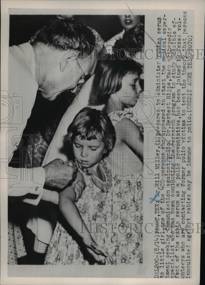 1951 Press Photo Dr. Will Miller administers anti rabies serum to the child - Historic Images