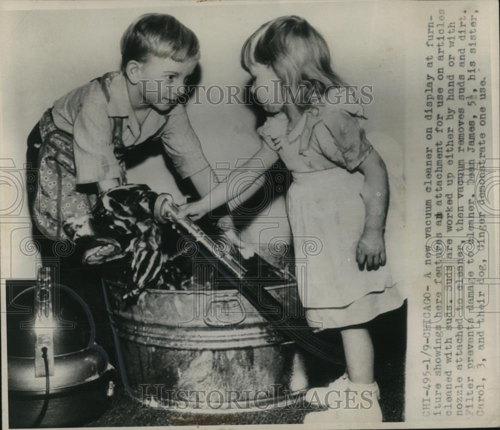 1947 Press Photo The new vacuum cleaner on display on a furniture showing - Historic Images