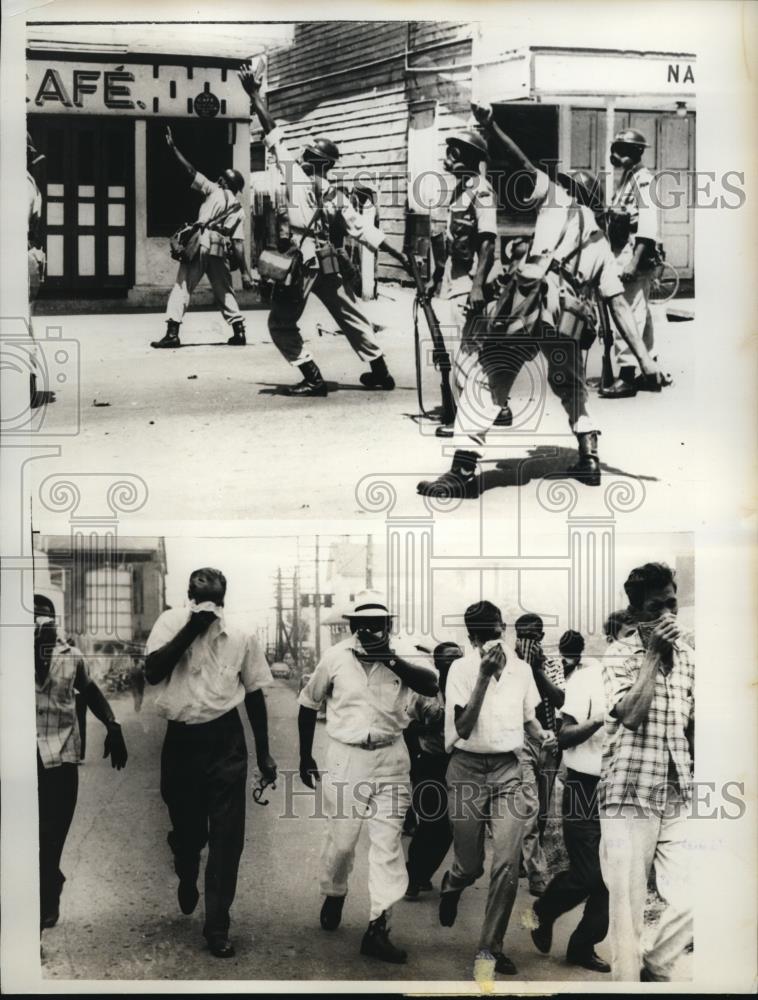 1962 Press Photo Police throw tear gas bombs to break up demonstration against - Historic Images