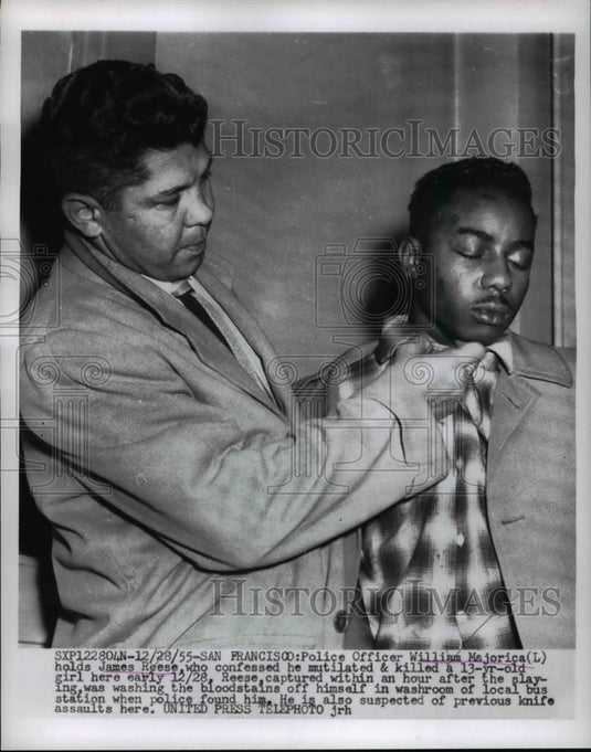 1955 Press Photo Police Officer William Majorica Holding James Reese - Historic Images