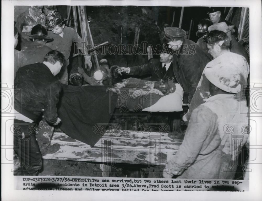 1956 Press Photo Detroit Mich Fred Scott rescued from cave in of sewer trench - Historic Images