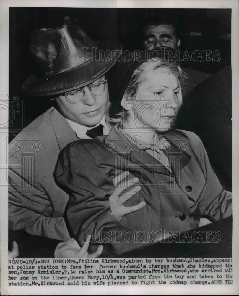 1951 Press Photo Mrs. Philine Kirkwood, aided by her husband Charles, appears - Historic Images