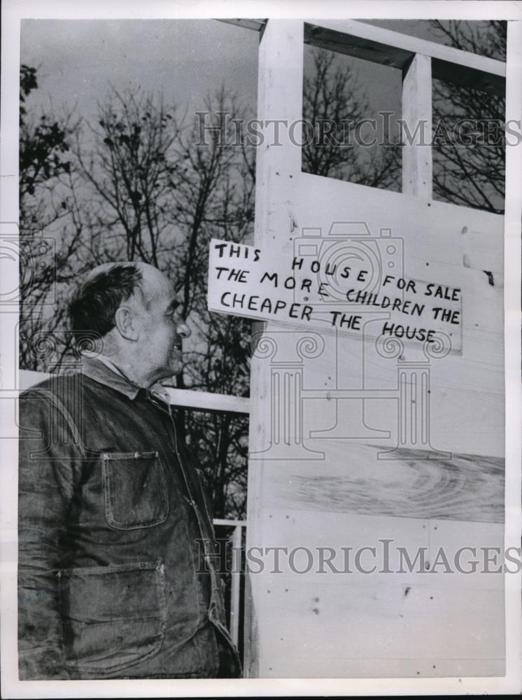 1953 Press Photo Joseph Rollar, house builder with the signage he has put up - Historic Images