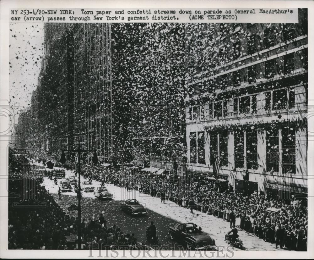 1951 Press Photo Torn paper and confetti streams down on parade as General - Historic Images