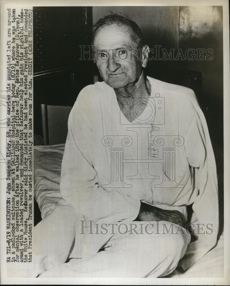 1947 Press Photo John sampson Kirby carries his amputated Arm in his suitcase. - Historic Images