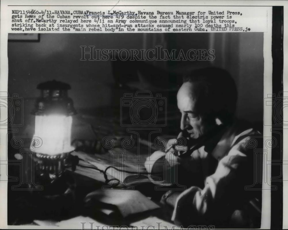 1958 Press Photo United Press Francis McCarthy gets news on Cuban revolt - Historic Images