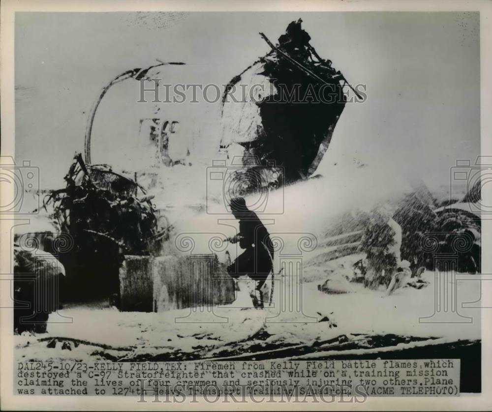 1951 Press Photo Firemen from Kelly Field battle flames which destroyed a C-97 - Historic Images