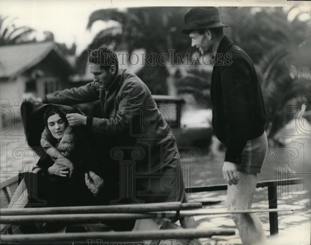 1938 Press Photo California Flood Victim Rescued in Boat, Covered with Blankets - Historic Images