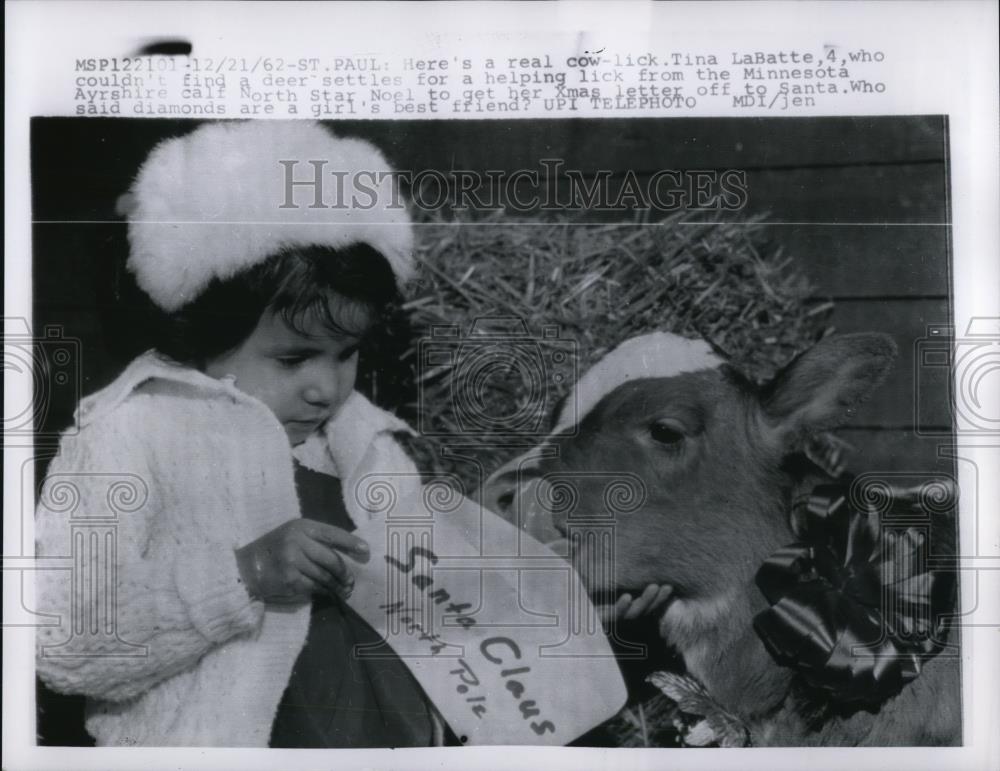 1962 Press Photo Tina LaBatte with the costumed deer leaking her Santa letter - Historic Images