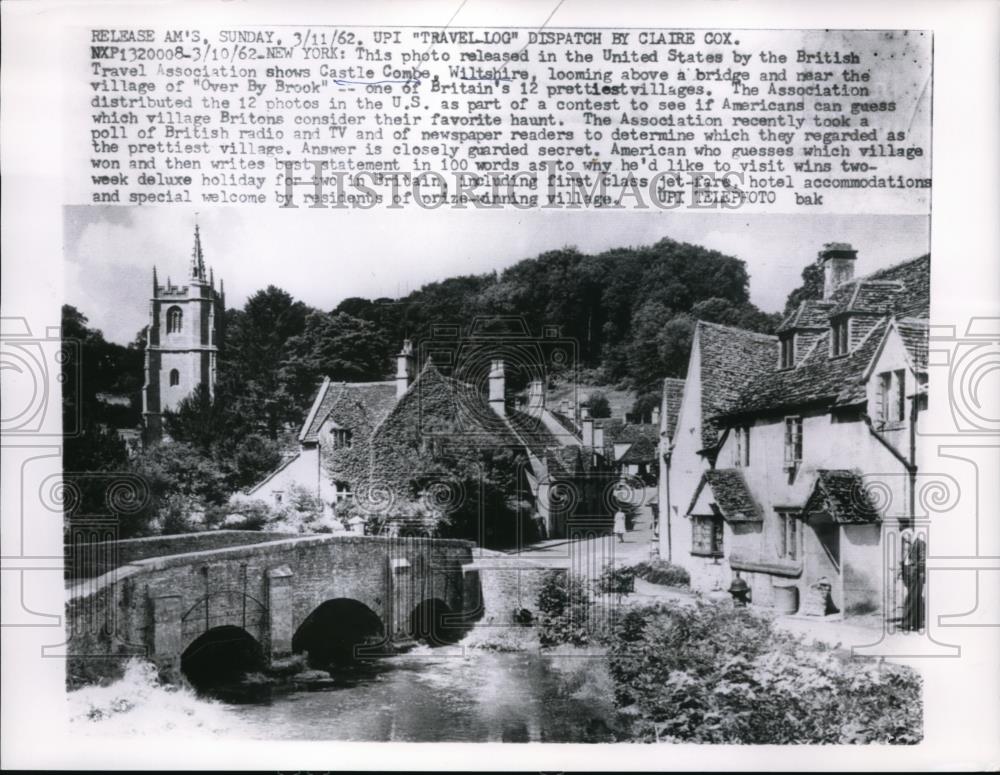 1962 Press Photo Castle Combe, Wiltshire, looming above a bridge - Historic Images