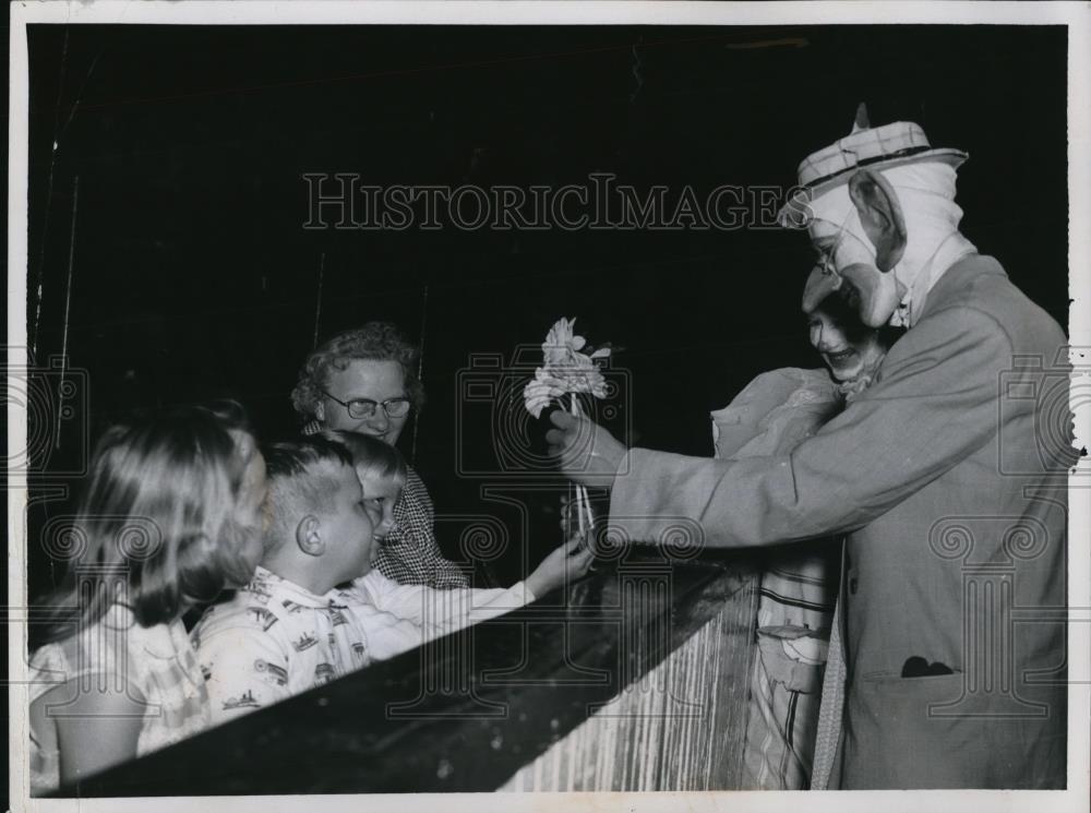 1958 Press Photo Boy Scouts played as a clown as they give joy to the children - Historic Images