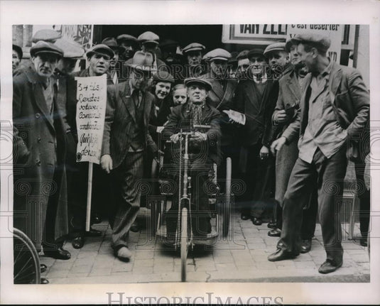 1937 Press Photo Disabled man & others in recent elections in Brussels, Belgium - Historic Images
