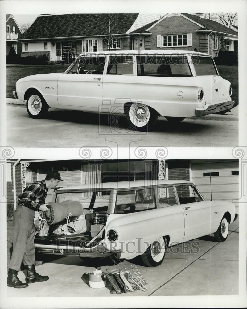 Press Photo man packing white station wagon - Historic Images