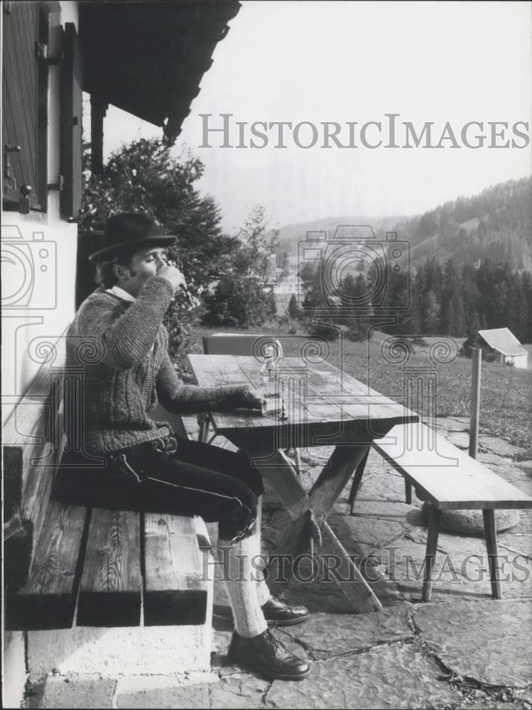 Press Photo Skier Christian Neureuther in mts at home in Germany - Historic Images