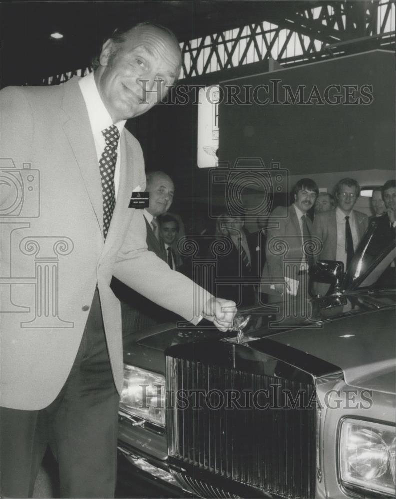 1980 Press Photo Henry Cooper, the former boxing champ at Motor show - Historic Images