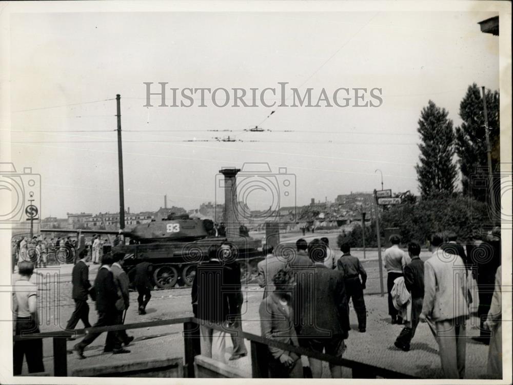 Press Photo Russian tank crosses over East German bridge to quell riots - Historic Images