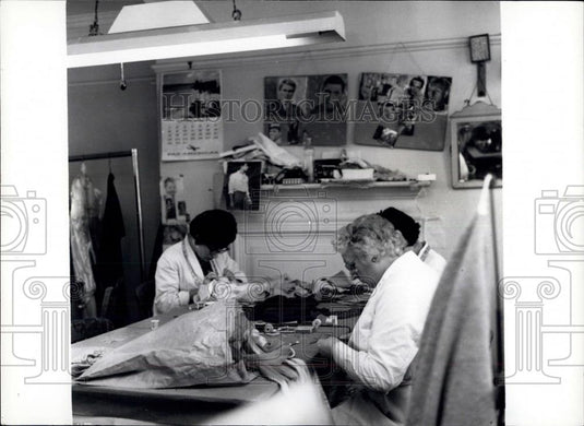 Press Photo women in the dress -making department & pictures of their actors - Historic Images