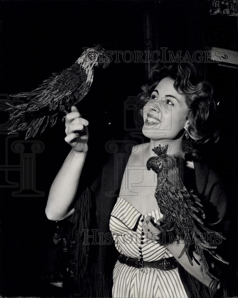 Press Photo Carole searches for "Props in "The delightful muddle" - Historic Images