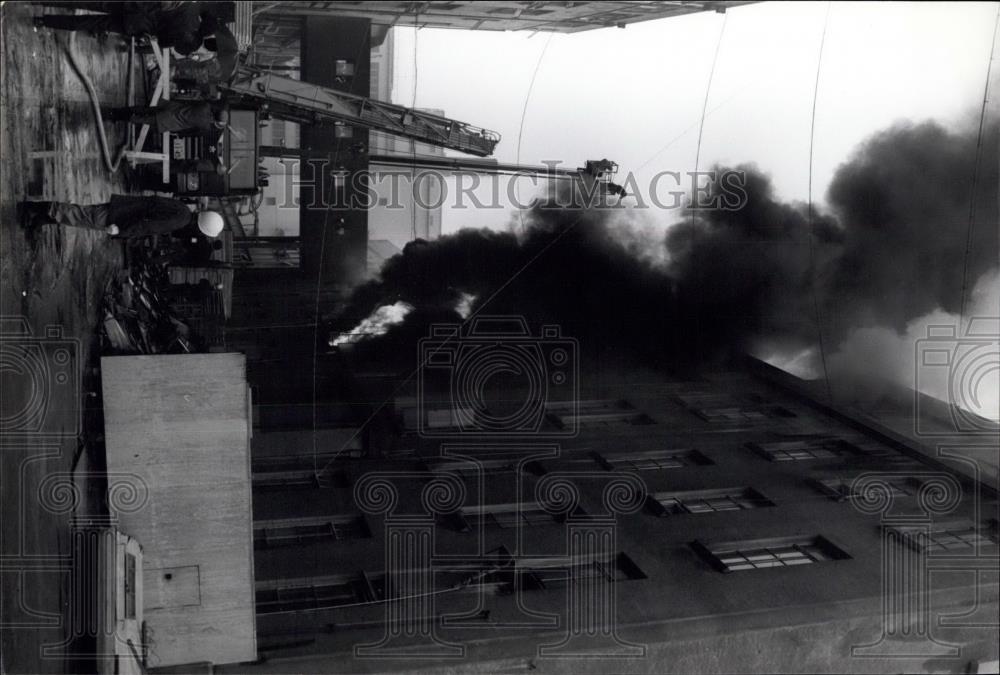 Press Photo Firemen Putting Out Burning Building - Historic Images