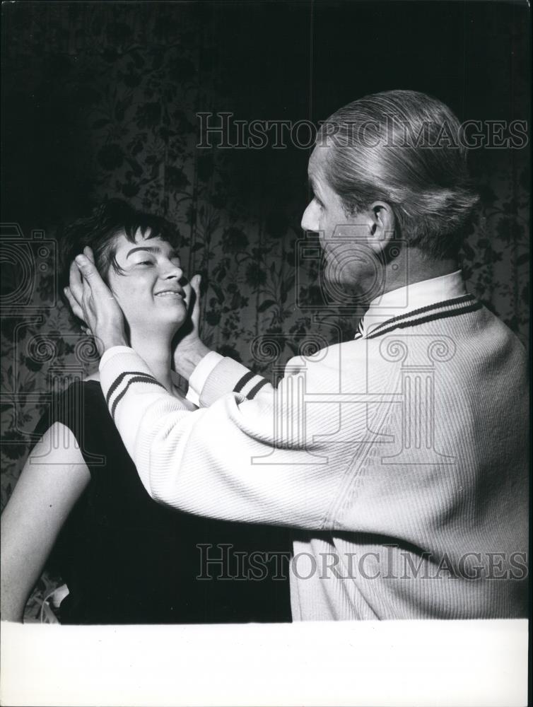 Press Photo Man Touches Woman&#39;s Face - Historic Images