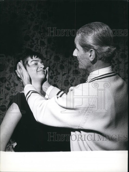 Press Photo Man Touches Woman's Face - Historic Images