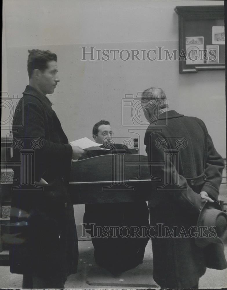 Press Photo A man receives advice from a monk - Historic Images