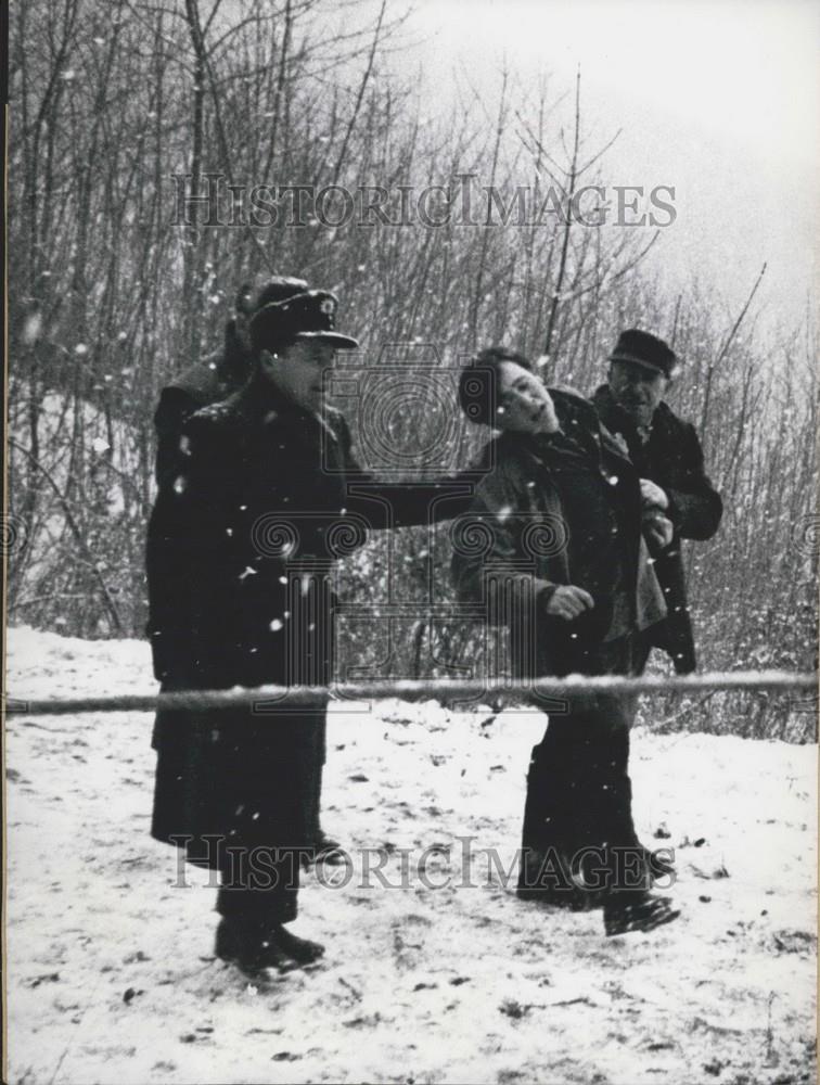 1958 Press Photo Brother of American Jet Fighter Pilot Restrained by Police. - Historic Images