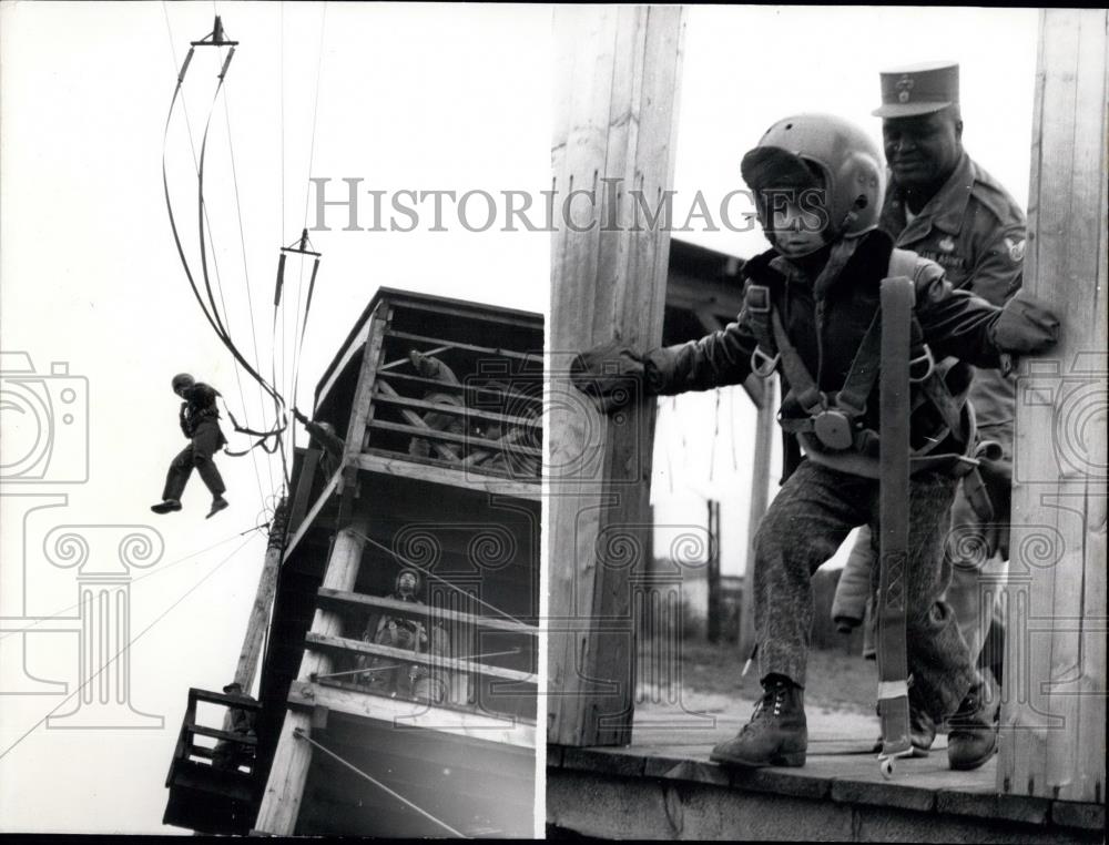 1957 Press Photo Child at US-Airborne parachute training - Historic Images