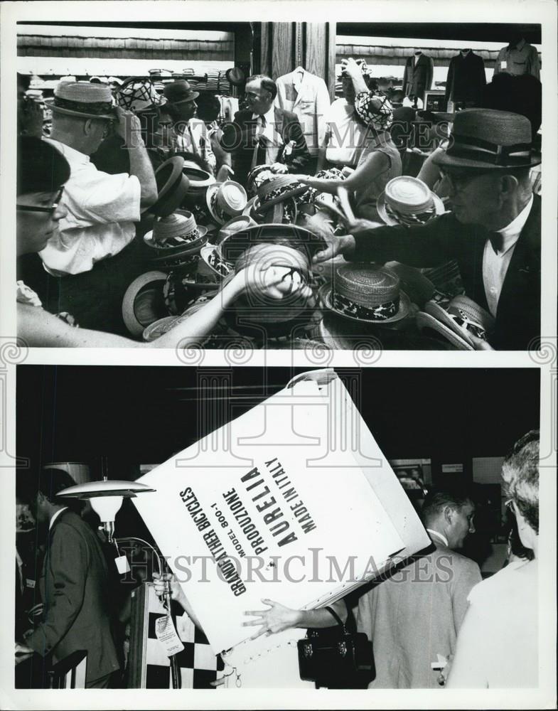 Press Photo A Crowd Gathers To Look At Hats - Historic Images