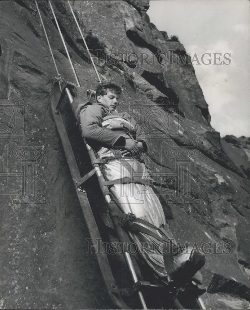 Press Photo C Wood acting as a mock victim being lowered down the Cliff face - Historic Images