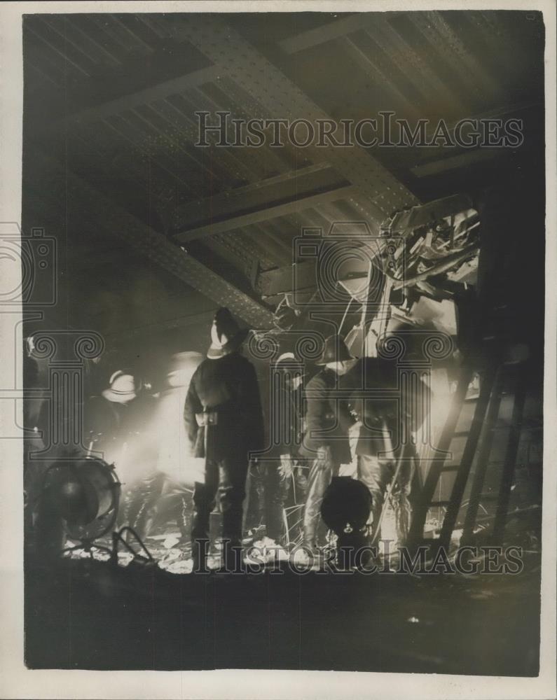 1957 Press Photo Firemen work among the wreckage of train crash - Historic Images