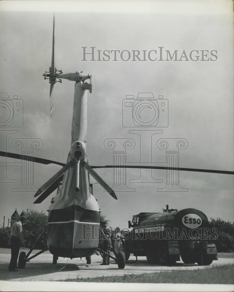 Press Photo heliport at Bonn, a machine is service and refueled from a tanker . - Historic Images
