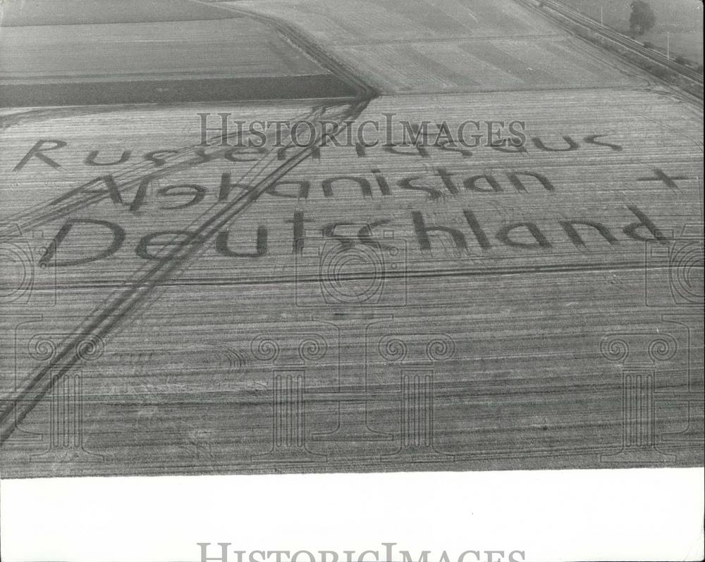 Press Photo West German farmer Erich carved message to Russians in field - Historic Images