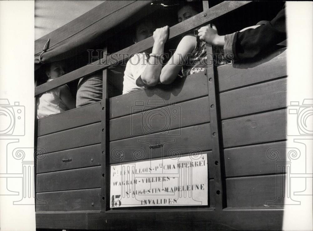 1953 Press Photo Strike In Paris: Parisians Boarding a military Truck ,no busses - Historic Images