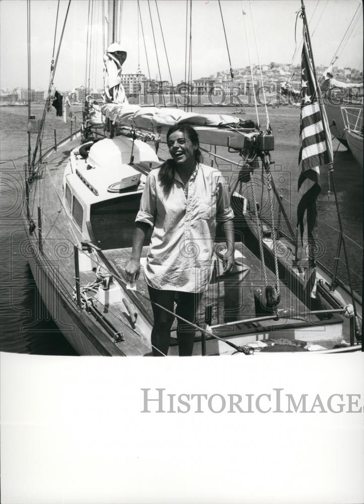 Press Photo Girl Laughing On Her Boat During Docking - Historic Images