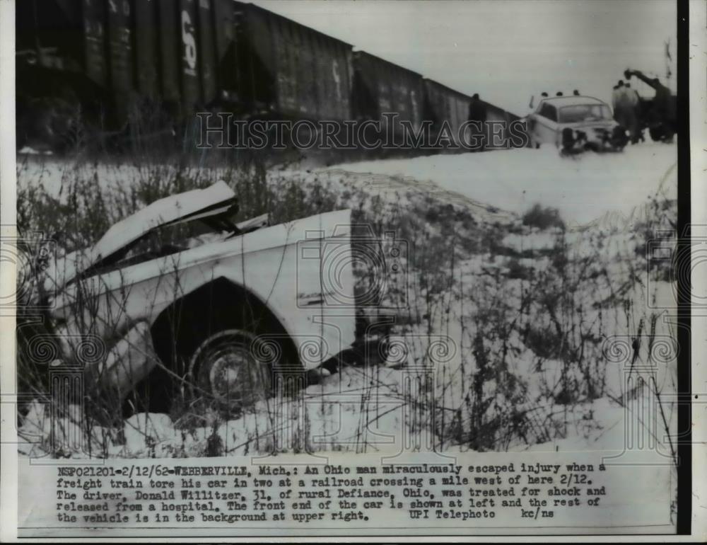 1962 Press Photo Donald Willitzer Survives Car Crashing into Train Webberville - Historic Images