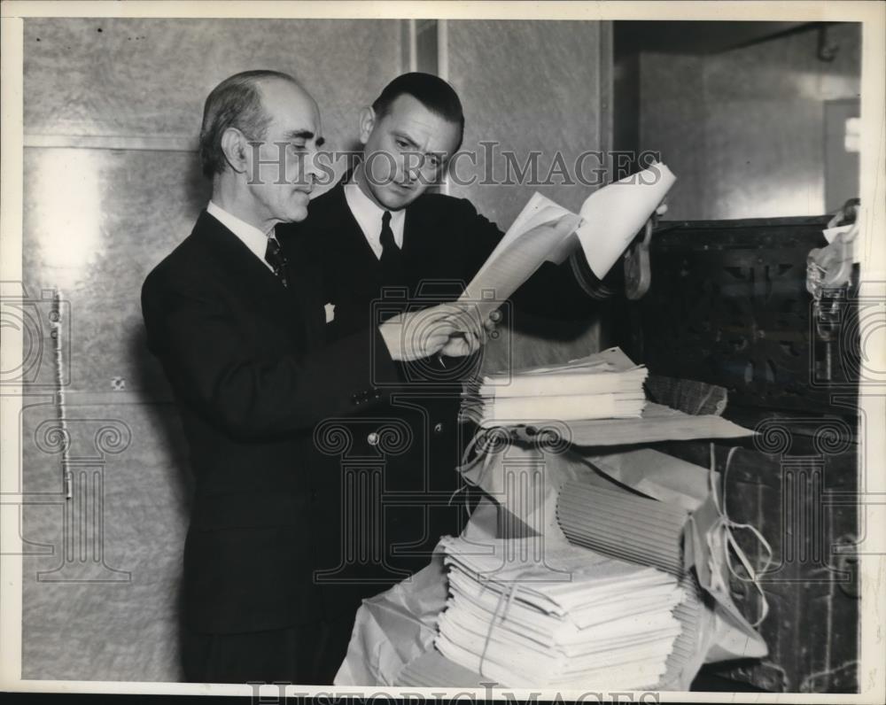 1937 Press Photo of W. Orton Tewson receiving a three million word manuscript, - Historic Images