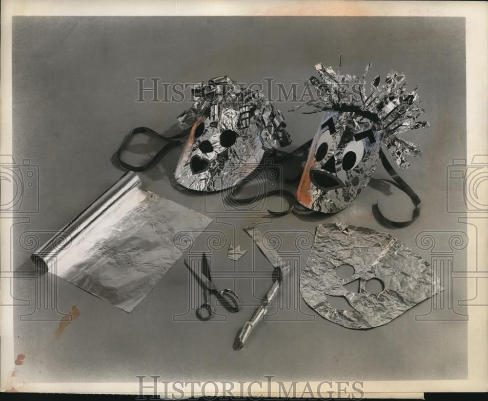 1957 Press Photo A couple of masks cut out from aluminum - Historic Images