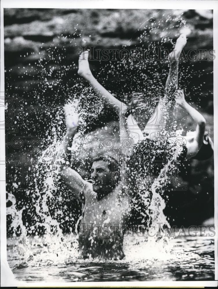 1961 Press Photo of Interior Secretary Stewart L. Udall playing in the water - Historic Images