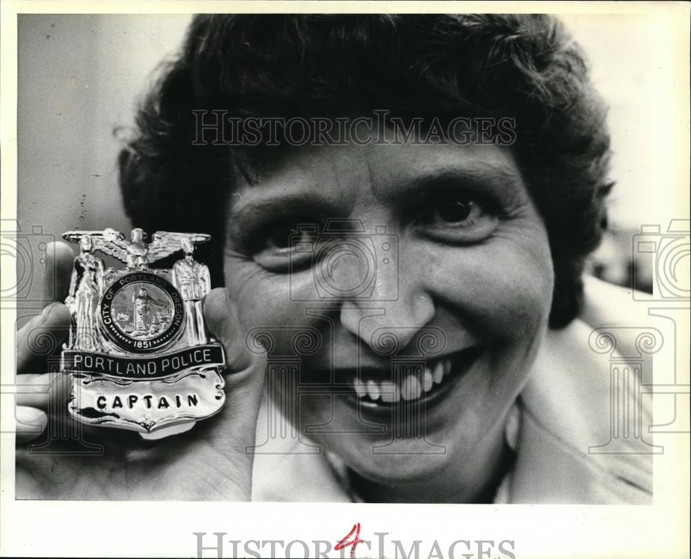 1980 Press Photo Capt. Penny Orazetti holding a badge - ora31853 - Historic Images