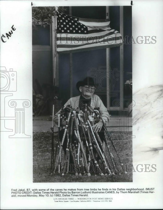 1982 Press Photo Fred Jakel 87 with canes he makes from tree limbs he finds - Historic Images