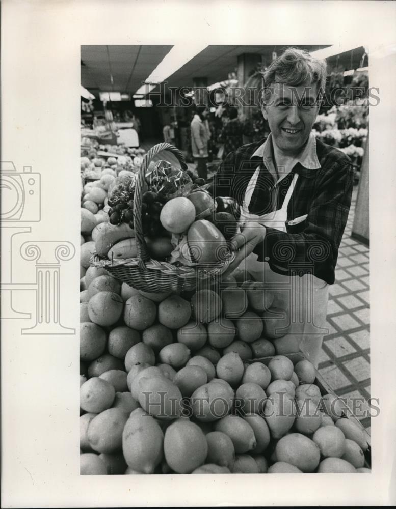 1975 Press Photo Jasper Giannini holding a basket full of fruit - ora25193 - Historic Images